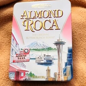 Brown & Haley Almond Roca Collectible Tin with original paperwork.